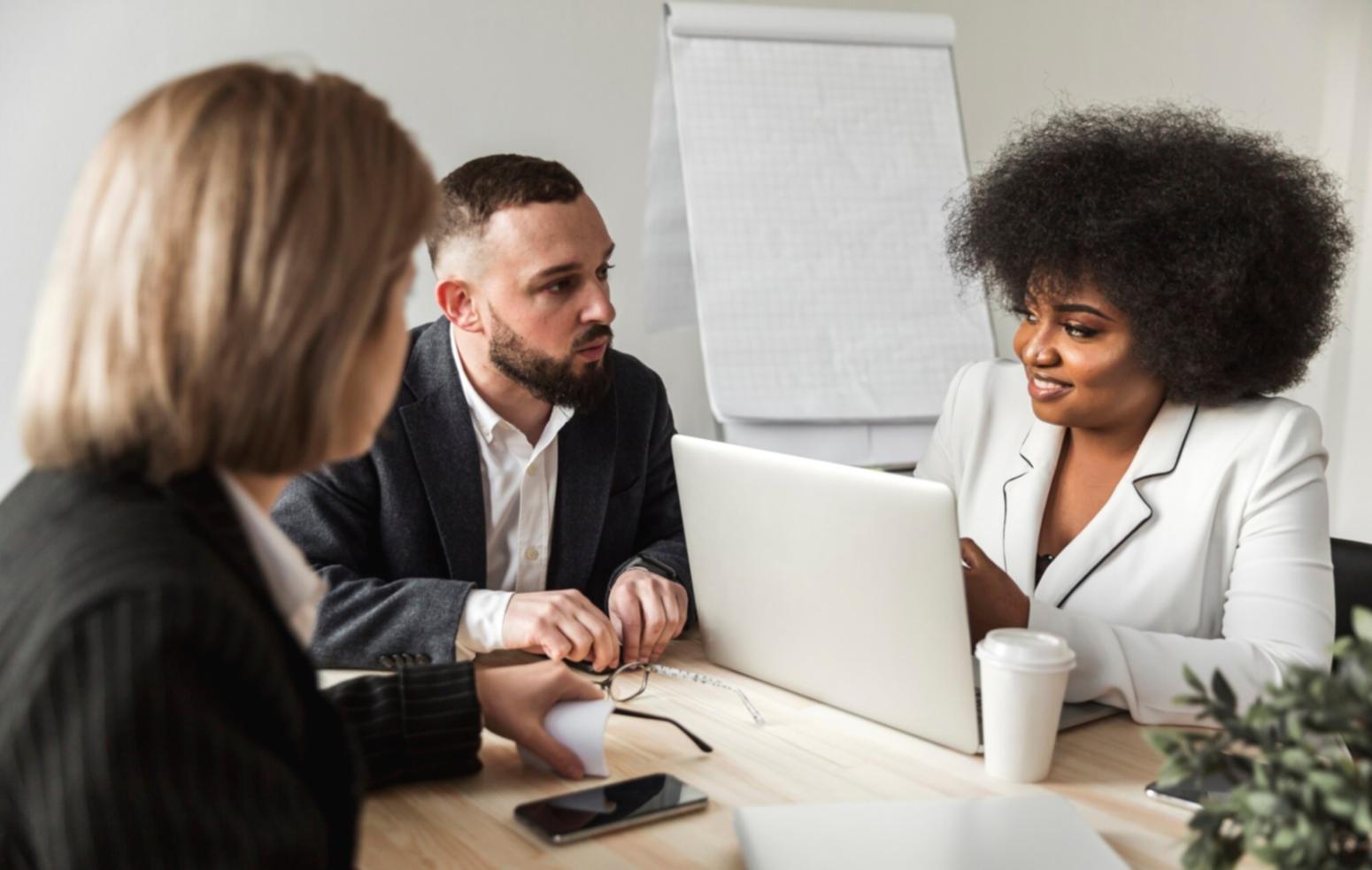 Students engaged in collaborative financial learning session